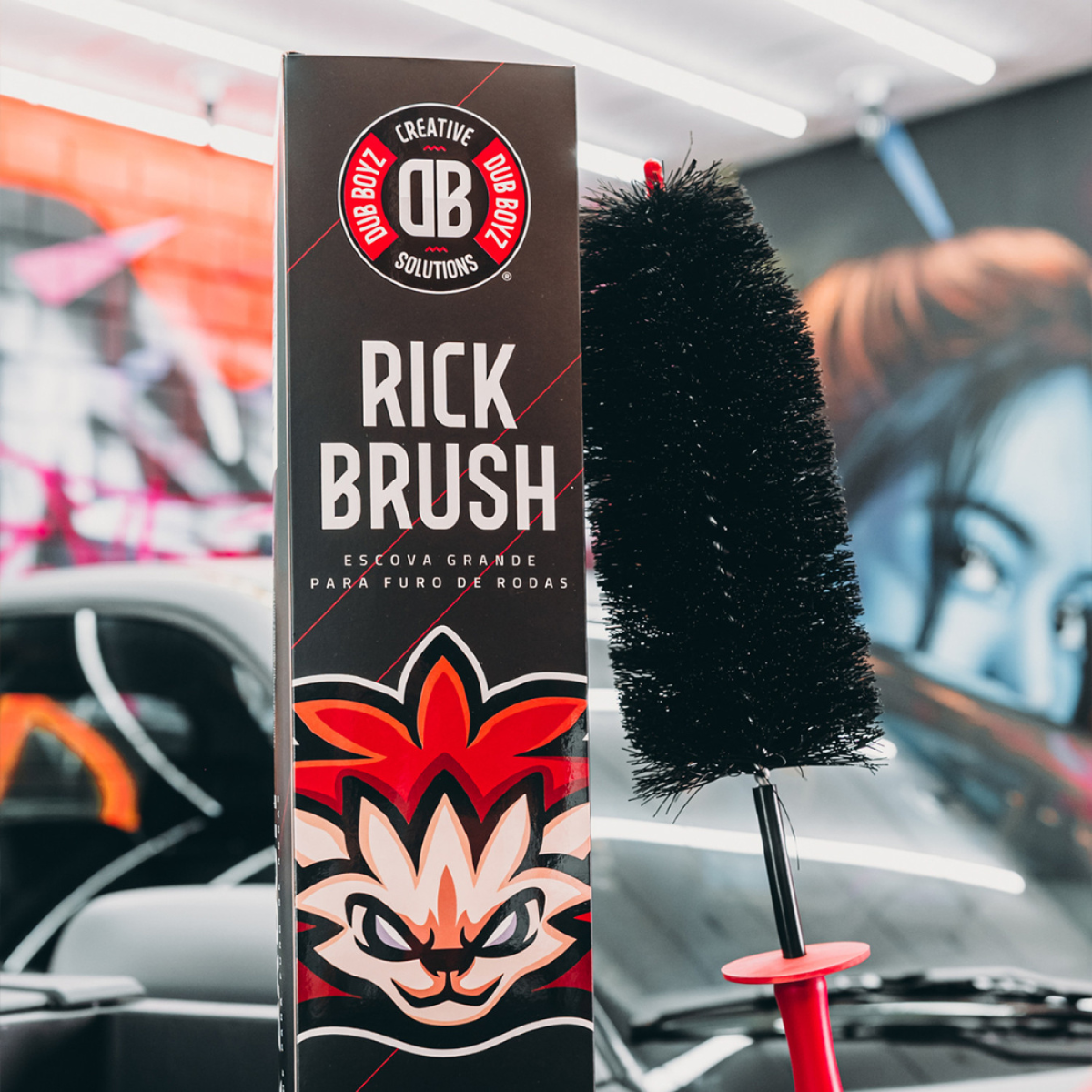 Wheel hole cleaning brush used on rim to remove brake dust